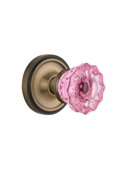 Classic Rosette Door Set with Colored Fluted Crystal Glass Knobs Pink in Antique Brass.